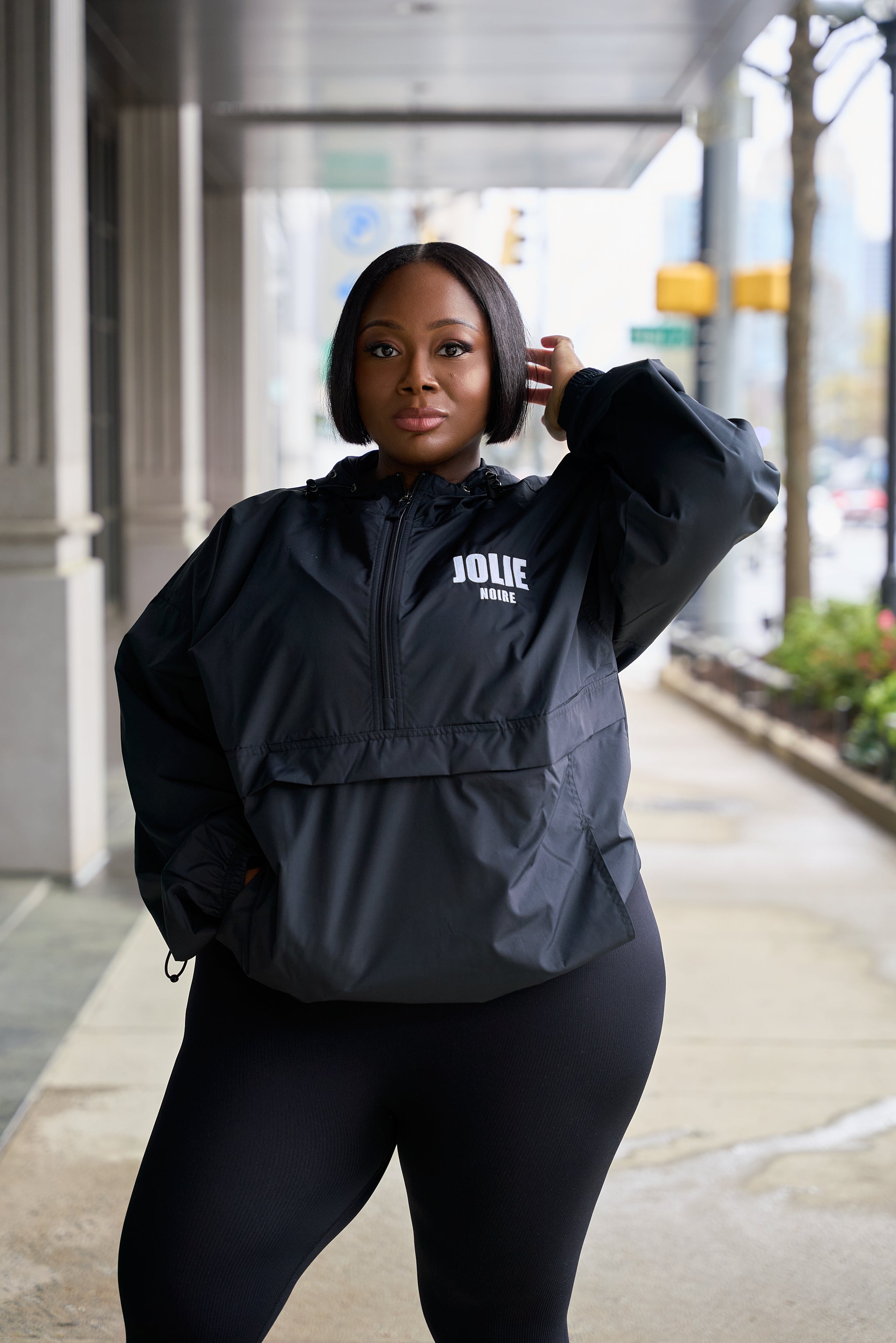 Jolie Noire Embroidered Champion Packable Jacket- Black